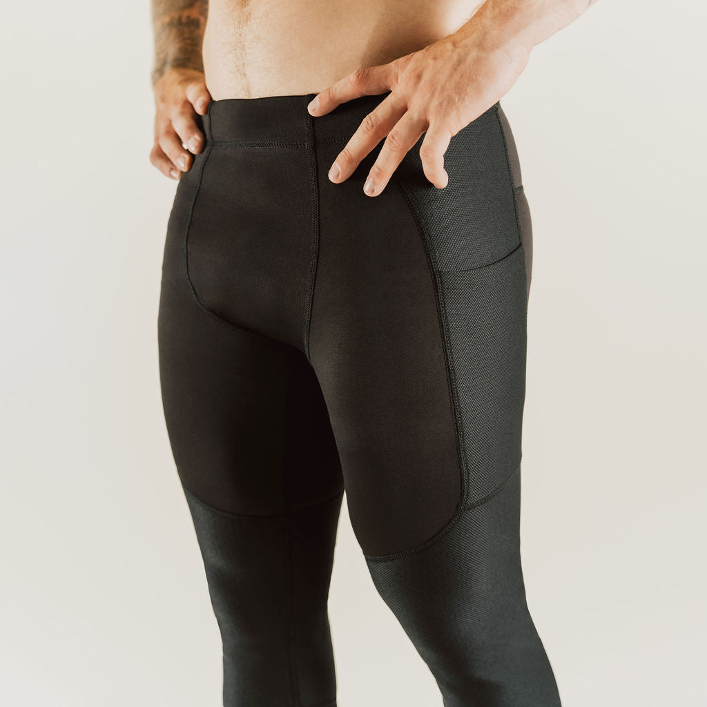 Men's low-rise black compression pants, 7/8 length, side seam and panel detail