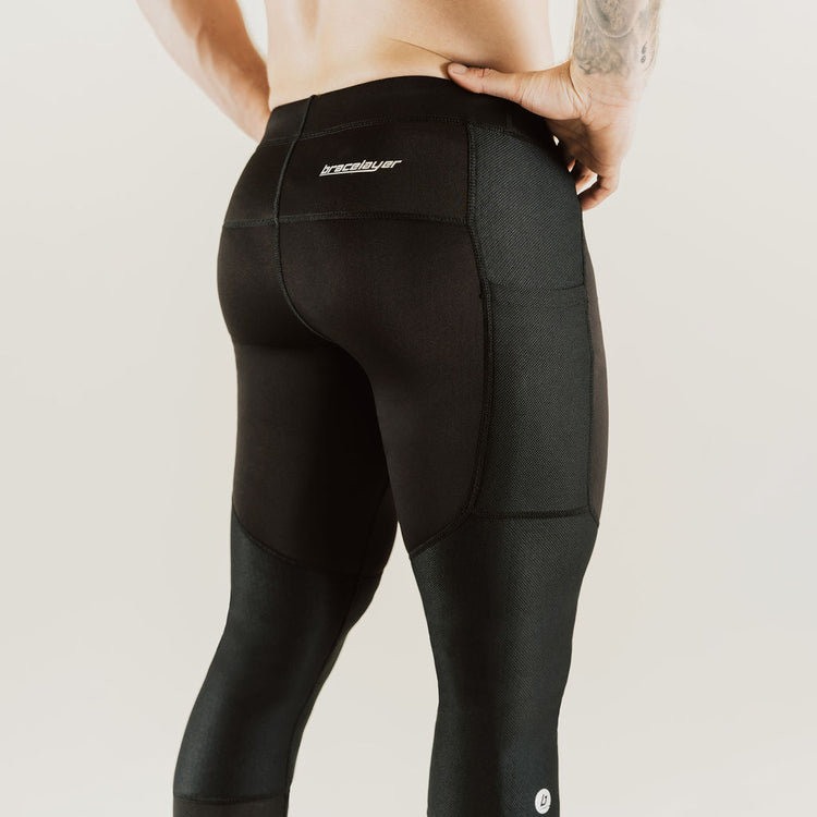 Men's low-rise black compression pants, 7/8 length with knee support panels